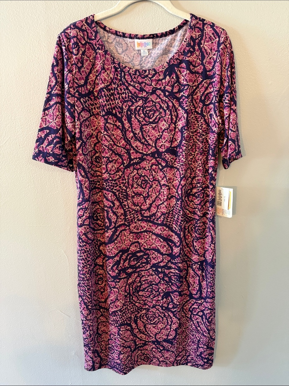 LuLaRoe Pink & Navy Floral Abstract Carly Dress